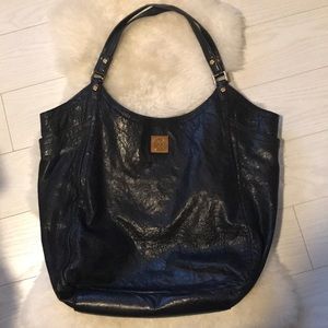 Tory Burch Black shoulder Boho tote.